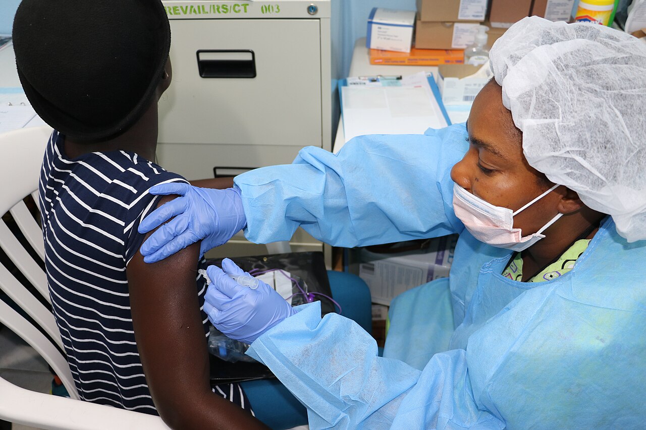 Study volunteer receives inoculation at Redemption Hospital in Monrovia, Liberia, during the opening days of PREVAC, a Phase 2 Ebola vaccine trial in West Africa.